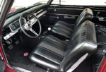 012 1965 Chevy Nova bucket seats black interior with floor shifter and retro dash trim