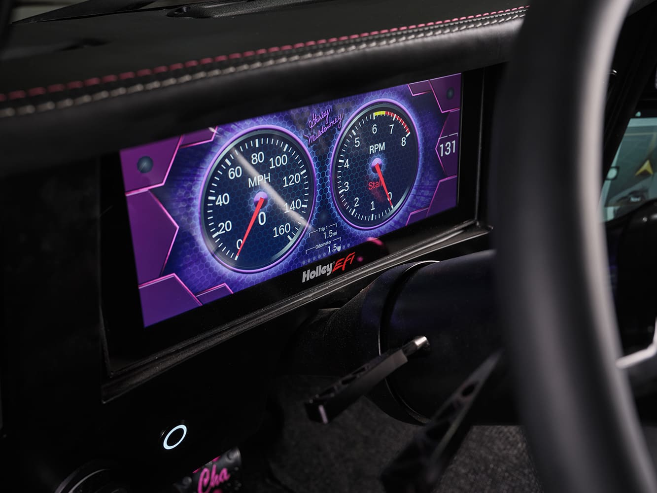 012 1969 Chevy Nova uses Holley EFI digital gauges with purple themed layout and readouts