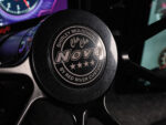 013 1969 Chevy Nova steering wheel badge honors Shirley Muldowney with custom Cha Cha Nova logo