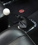 014 1965 Chevy Nova white Hurst shift knob and black leather boot on 4 speed
