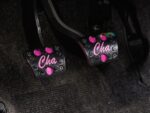 014 1969 Chevy Nova billet pedals engraved with pink “Cha” logos add unique flair