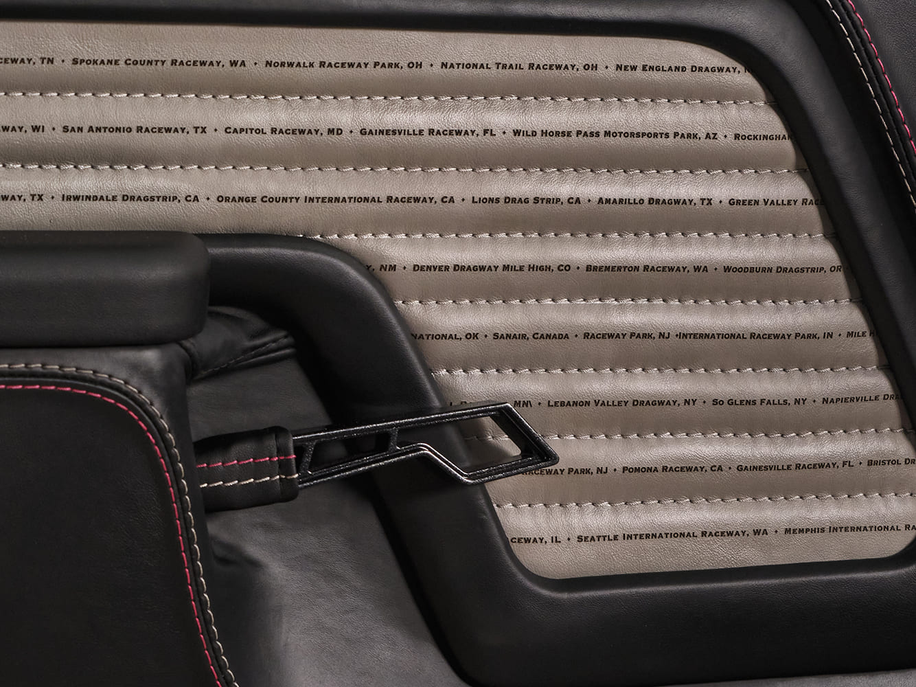 017 1969 Chevy Nova door panel embroidered with iconic dragstrip names across stitched inserts