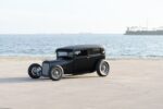 02 1929 Ford Tudor highboy coupe at the beach with full fender delete and staggered stance
