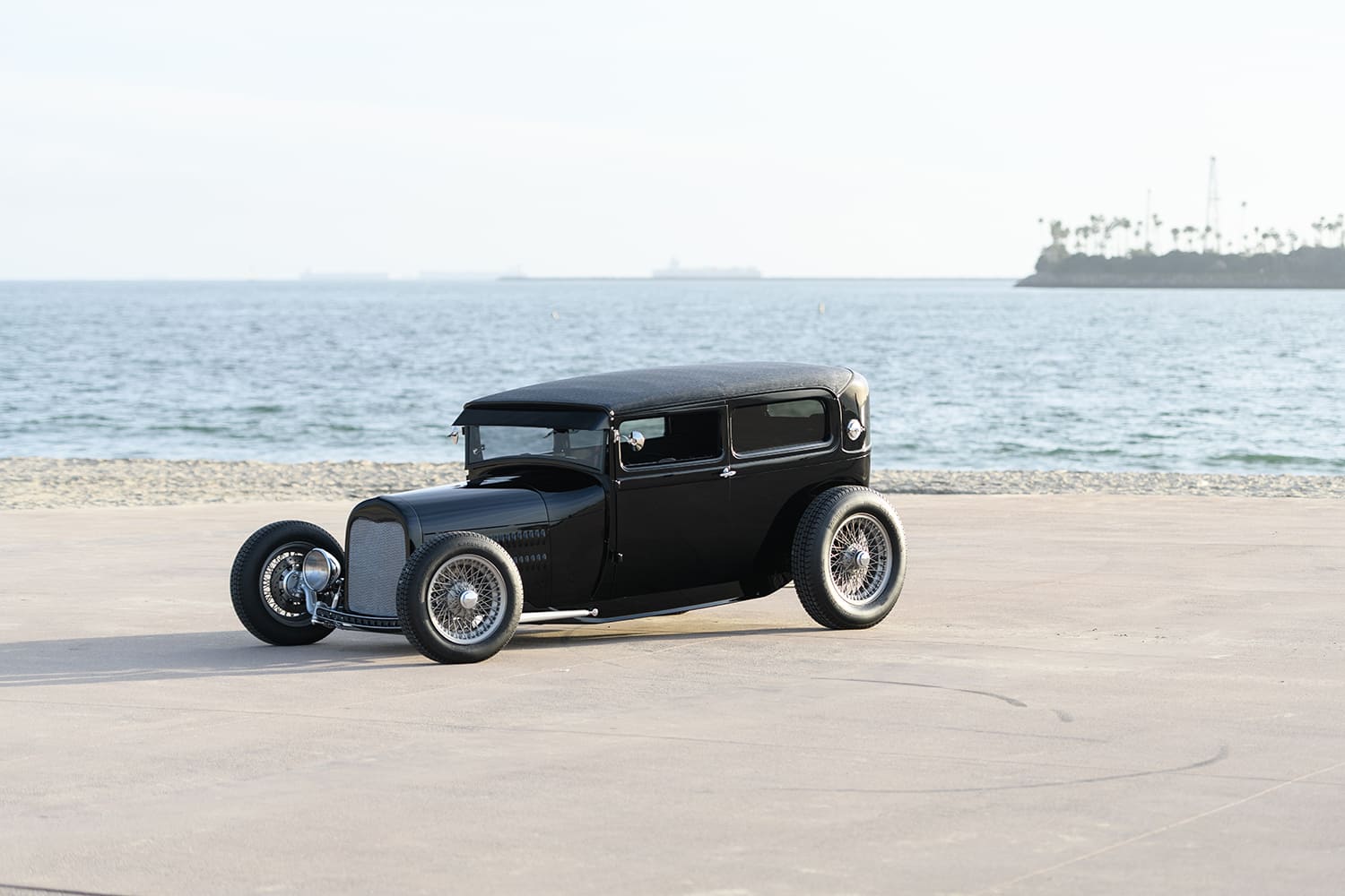 02 1929 Ford Tudor highboy coupe at the beach with full fender delete and staggered stance
