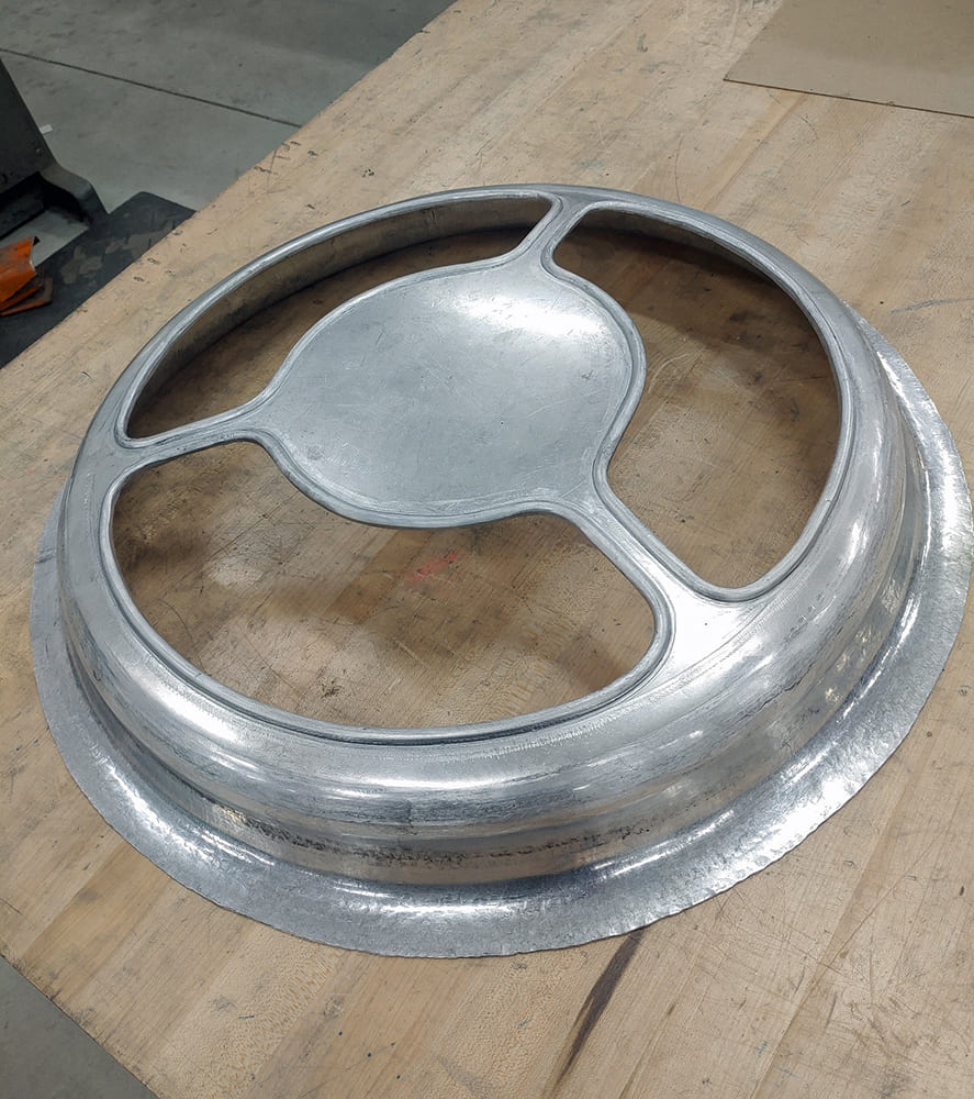 03 Divco hubcap fabrication process domed billet wheel insert forming