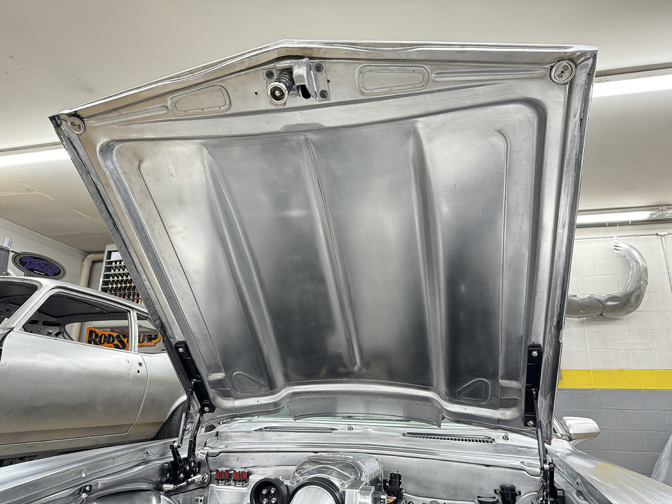 04 1969 Camaro hood underside bare metal with gas struts