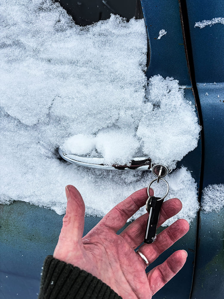 04 Vintage Chevy truck door handle frozen in snow with keys