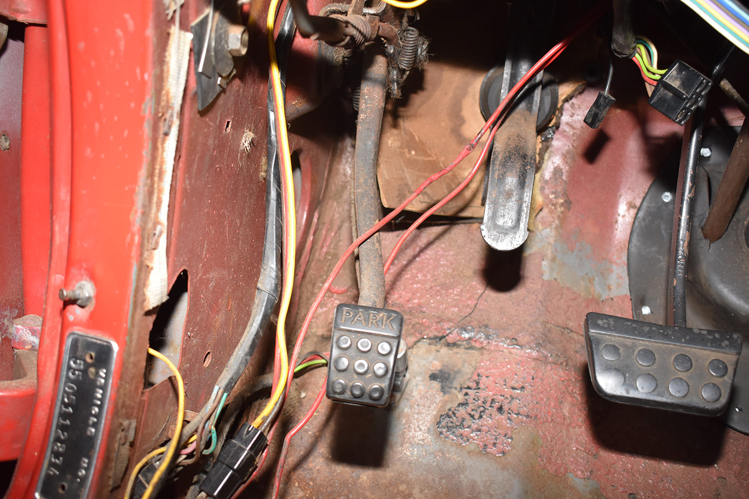 06 dodge pedal assembly old wiring exposed linkage worn insulation stripped interior view