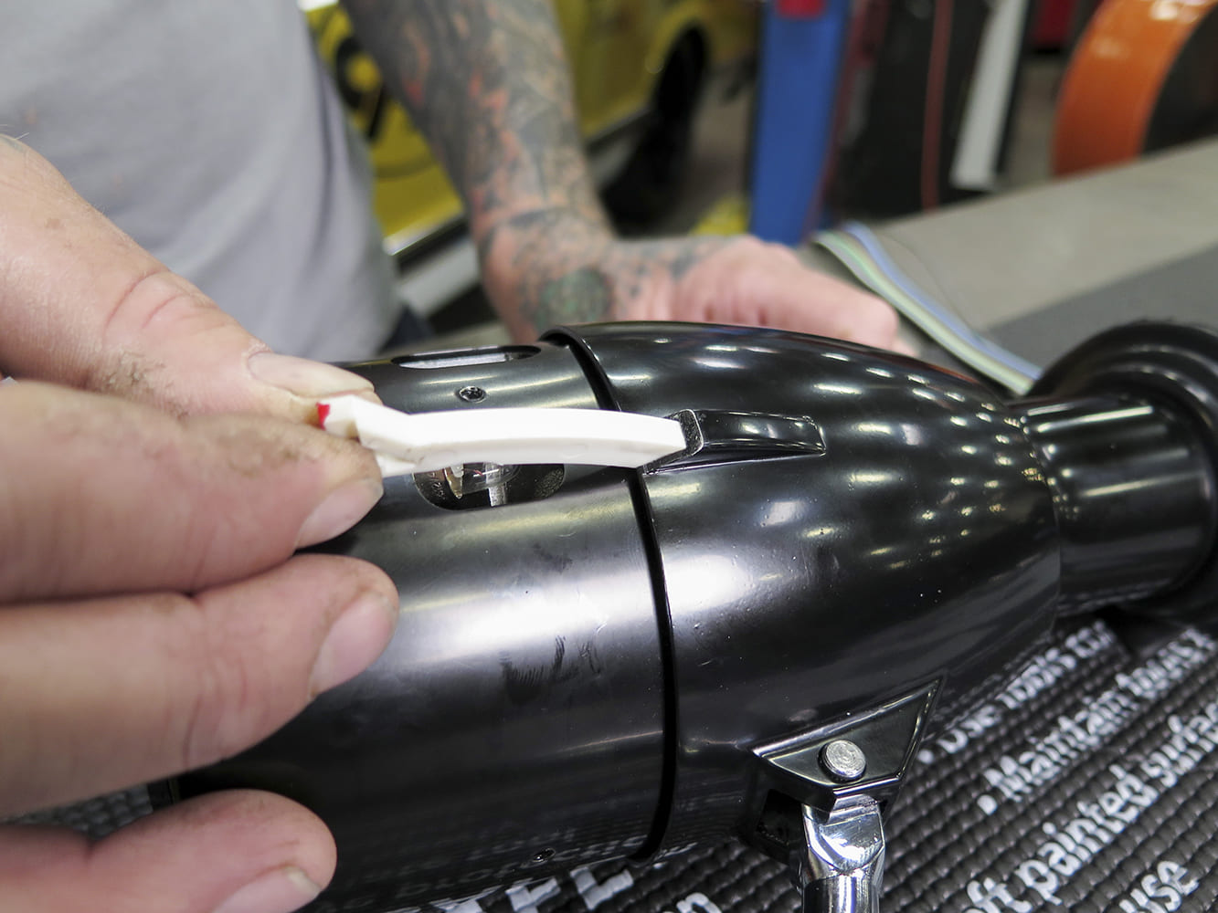 08 1972 Chevy C10 tilt column shift indicator needle being installed into the housing slot