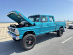 09 1971 Ford F 250 Crew Cab Highboy in bright teal with lifted suspension and off road wheels