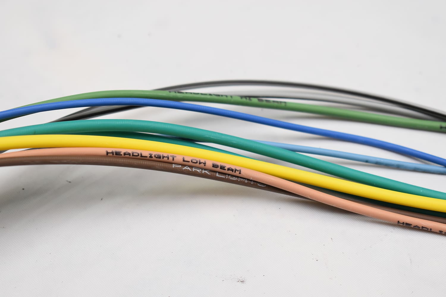 09 american autowire labeled wires headlight low beam park lights multicolor insulation close up