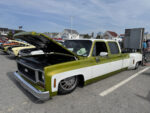 10 1974 Chevrolet C30 Dually Crew Cab in two tone green and white slammed on air suspension