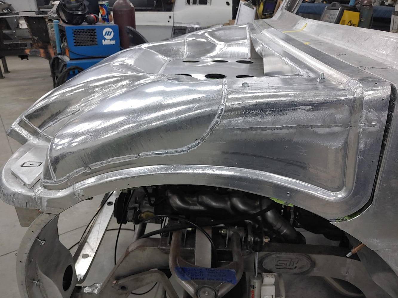 11 Divco inner fender hand fabbed aluminum engine bay cover bead rolled