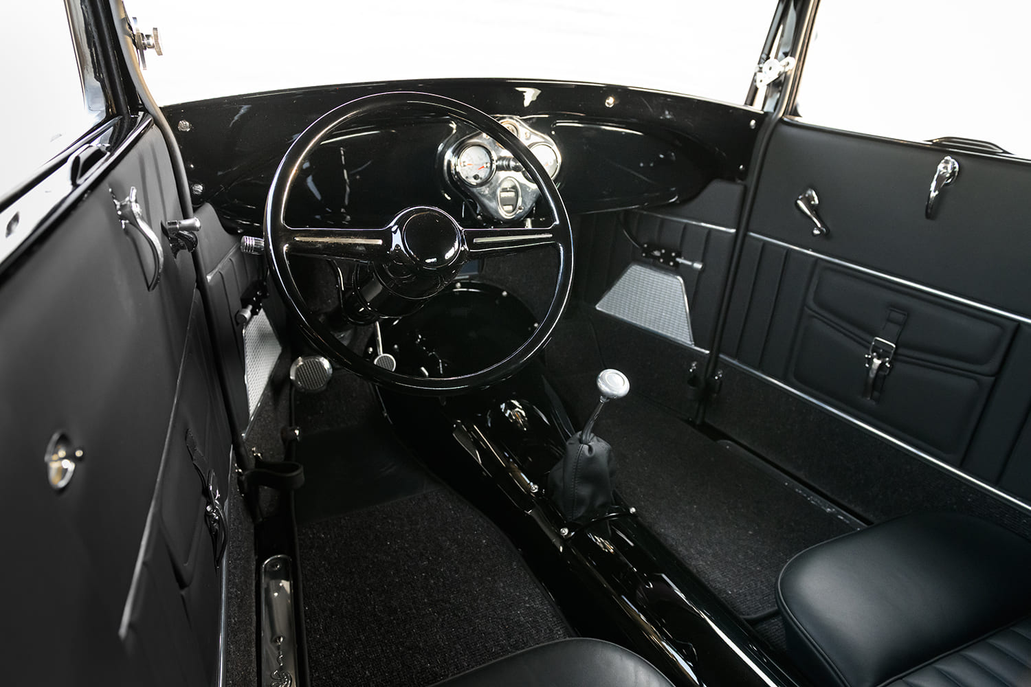 13 1929 Ford Tudor interior with gloss black dash billet pedals and Lokar shifter