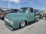 13 1955 Ford F100 in seafoam green with chrome smoothie wheels and mild drop stance