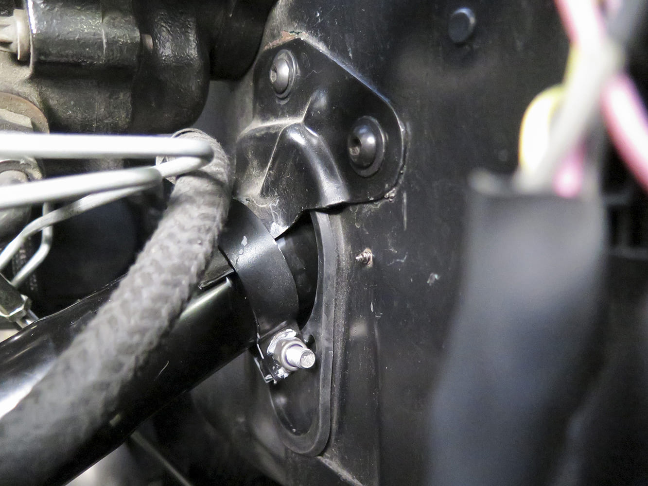 13 1972 Chevy C10 tilt column passes through firewall using rubber grommet and bracket mount