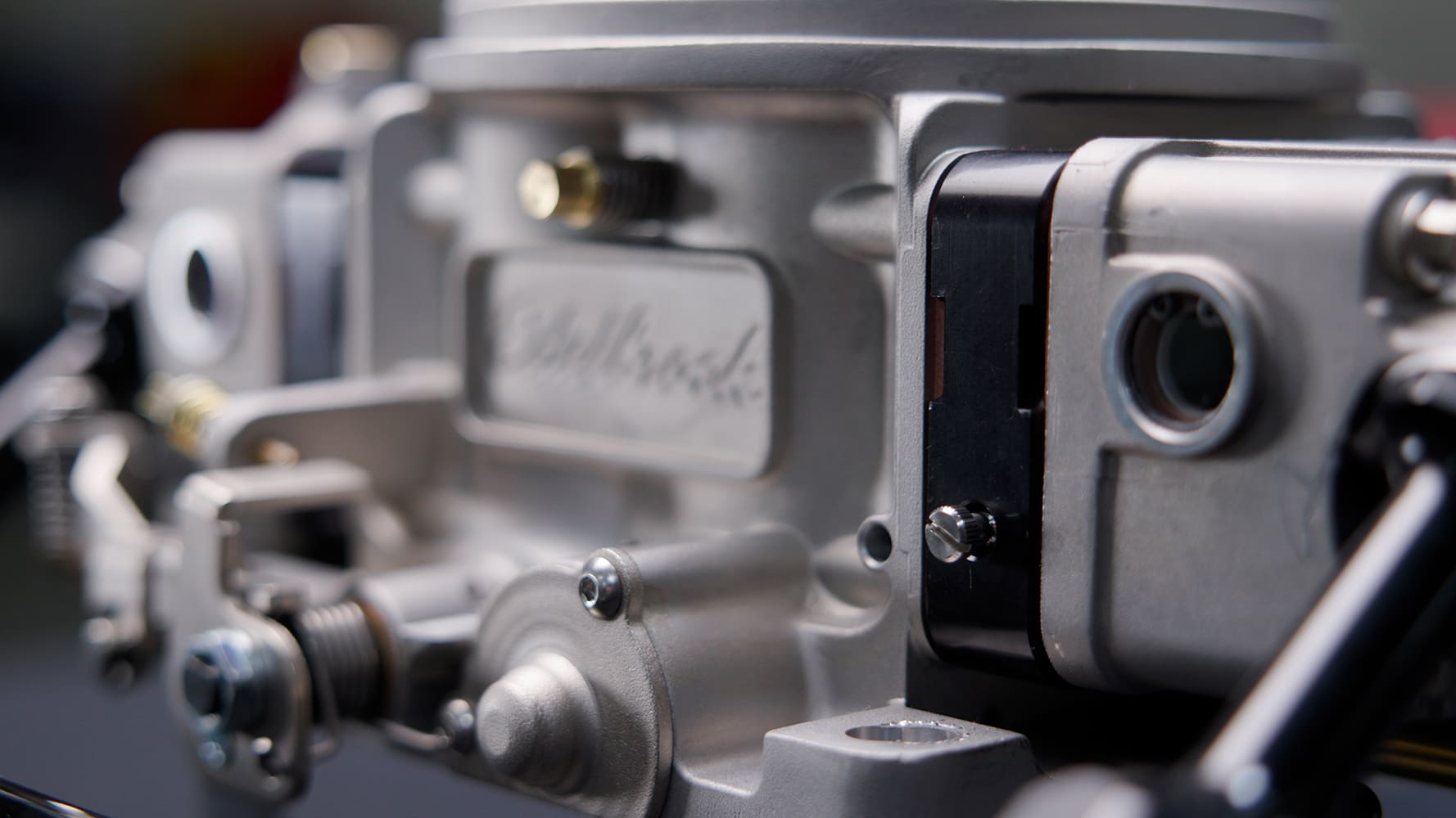 13 Edelbrock VRS 4150 throttle linkage and body detail show high precision cast finish and machining