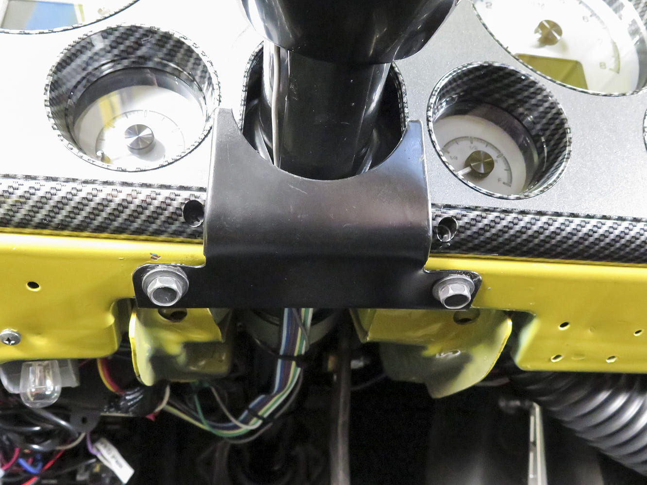 14 1972 Chevy C10 tilt column upper dash bracket mounted under custom carbon fiber bezel panel
