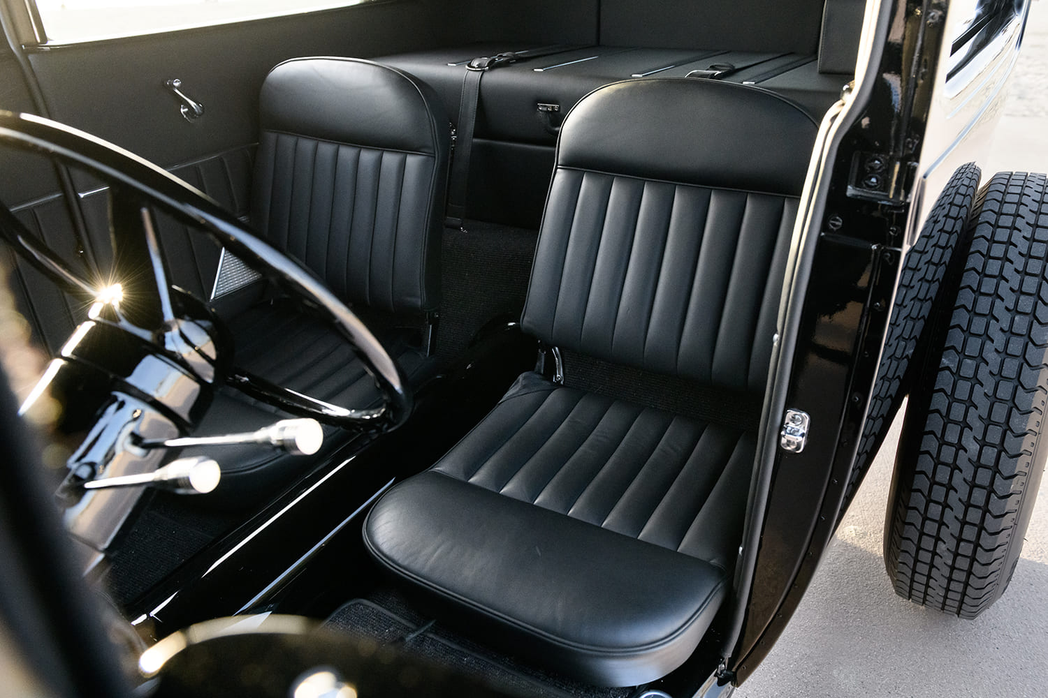 15 1929 Ford Tudor interior seats upholstered in vertical stitched black leather