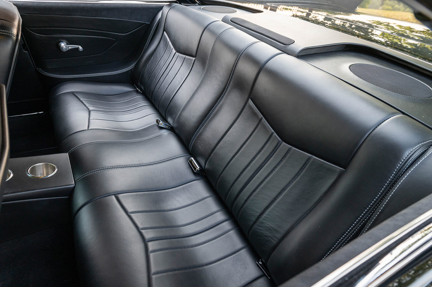 15 1959 Pontiac Catalina rear seat reupholstered in black leather with contrast stitching