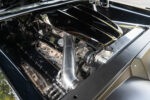 16 1959 Pontiac Catalina engine bay houses a Butler Performance Pontiac V8 with custom intake