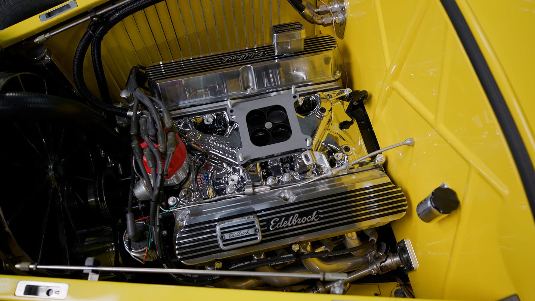 16 Edelbrock intake manifold prepped on a small block V8 in yellow hot rod