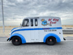 17 1951 Divco milk truck in white and blue paint with Ol King Cool HVAC shop livery