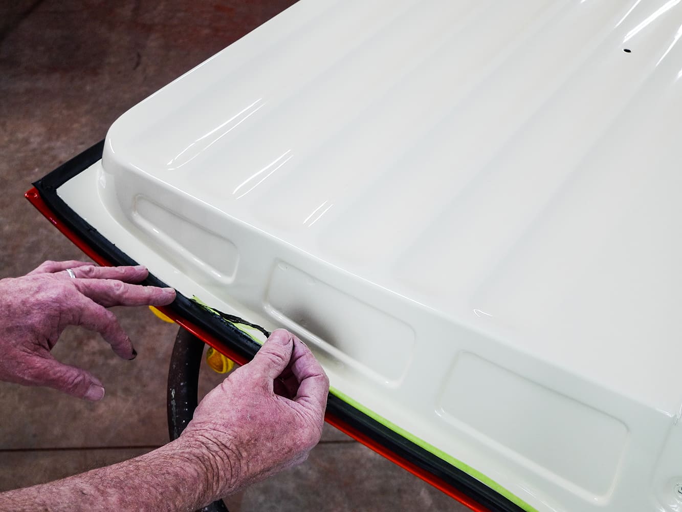 17 Peeling masking tape after seal install on restored Chevy truck door