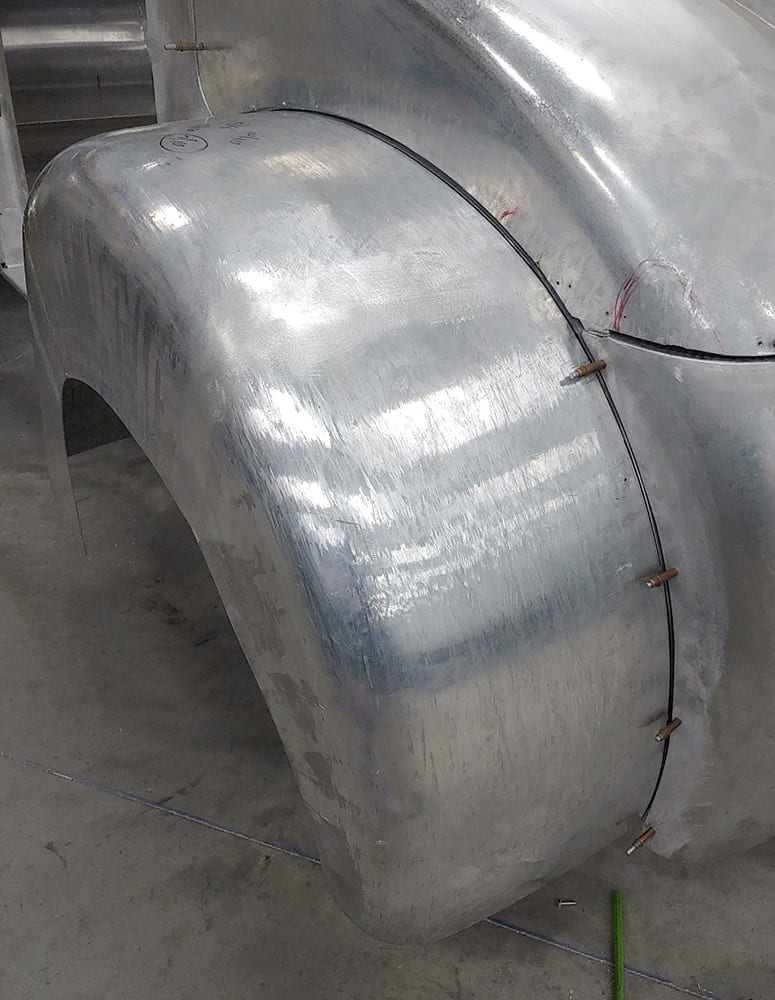 18 Divco rear fender mounted and shaped for profile clearance and stance