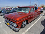 19 1963 Chevrolet C10 in metallic burnt orange with billet wheels and 383 stroker badge