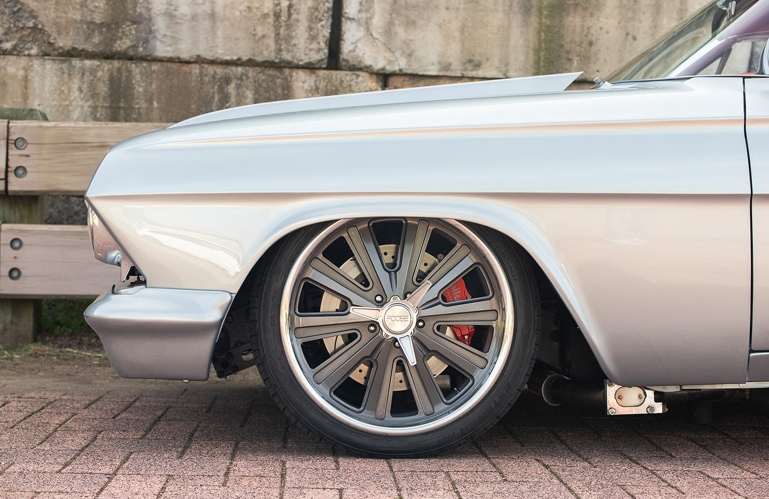 20 1962 Chevy Impala front wheel close up with Foose wheels and Wilwood brakes