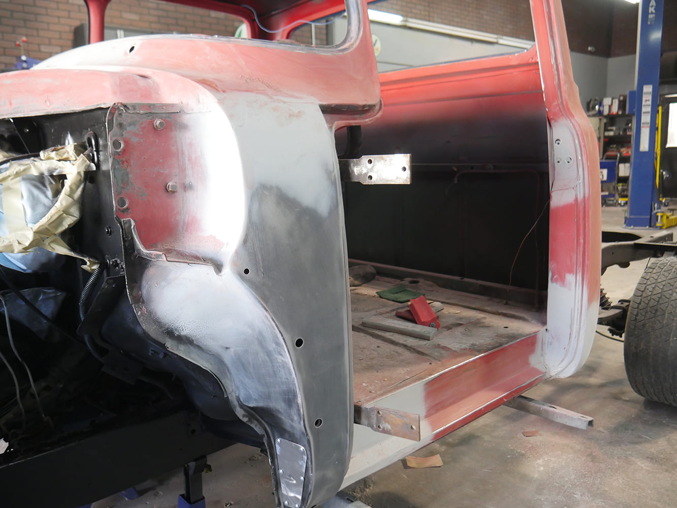 21 1956 Ford F 100 passenger side firewall and floor brace repair with bare metal finish