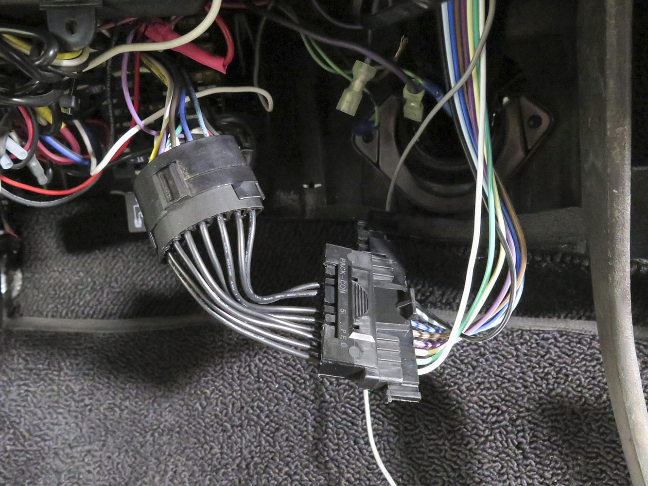 21 1972 Chevy C10 tilt column wiring harness connections shown with factory and aftermarket plugs under dash