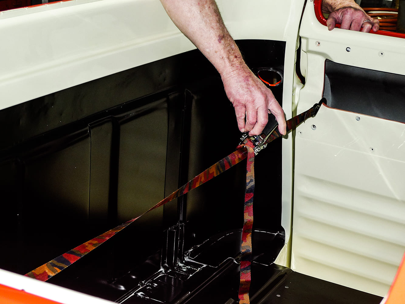 22 Chevy truck interior ratchet strap tensioning for panel alignment during assembly