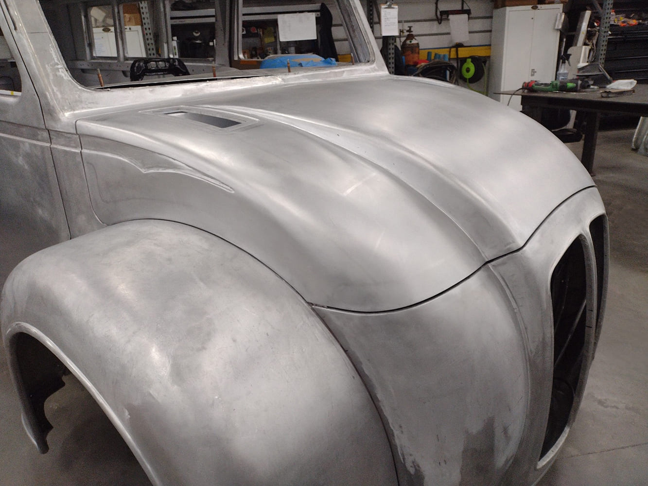 22 Divco full front clip fitted and aligned bead lines and hood contour visible