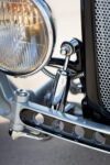 24 1929 Ford Tudor chrome shock mount and polished headlight bracket detail