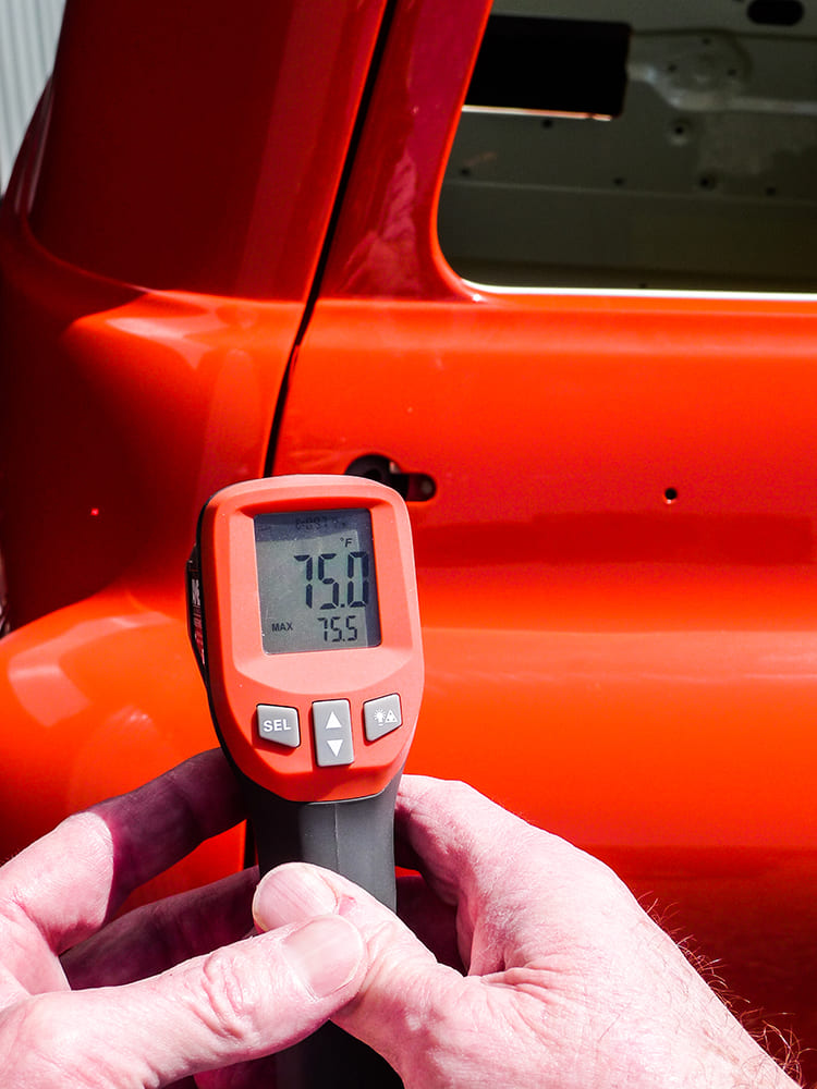 24 Infrared thermometer reading 75°F on Chevy truck door surface pre install