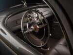 25 1936 Ford highboy interior view showing split bench chrome tilt column and custom banjo style steering wheel