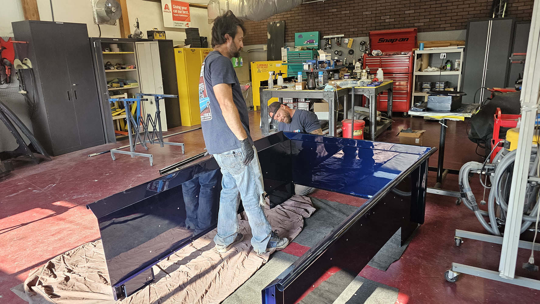 27 1956 Ford F 100 painted bed panels assembled on floor with protective blankets