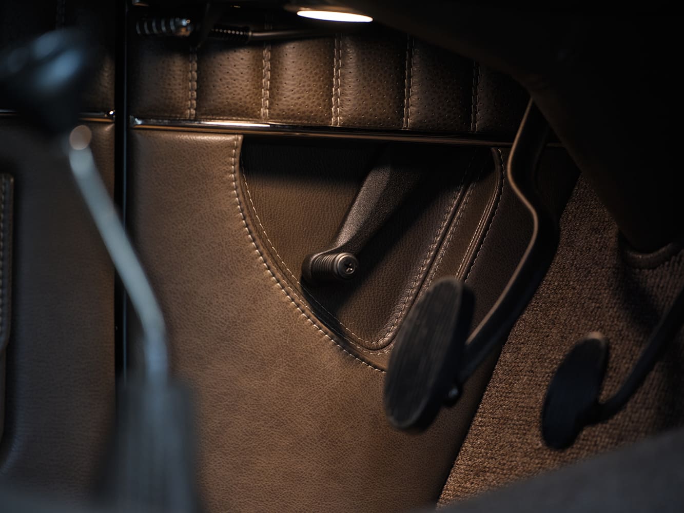 29 1936 Ford highboy custom pedals and carpeted footwell with underdash lighting and stitched leather detail