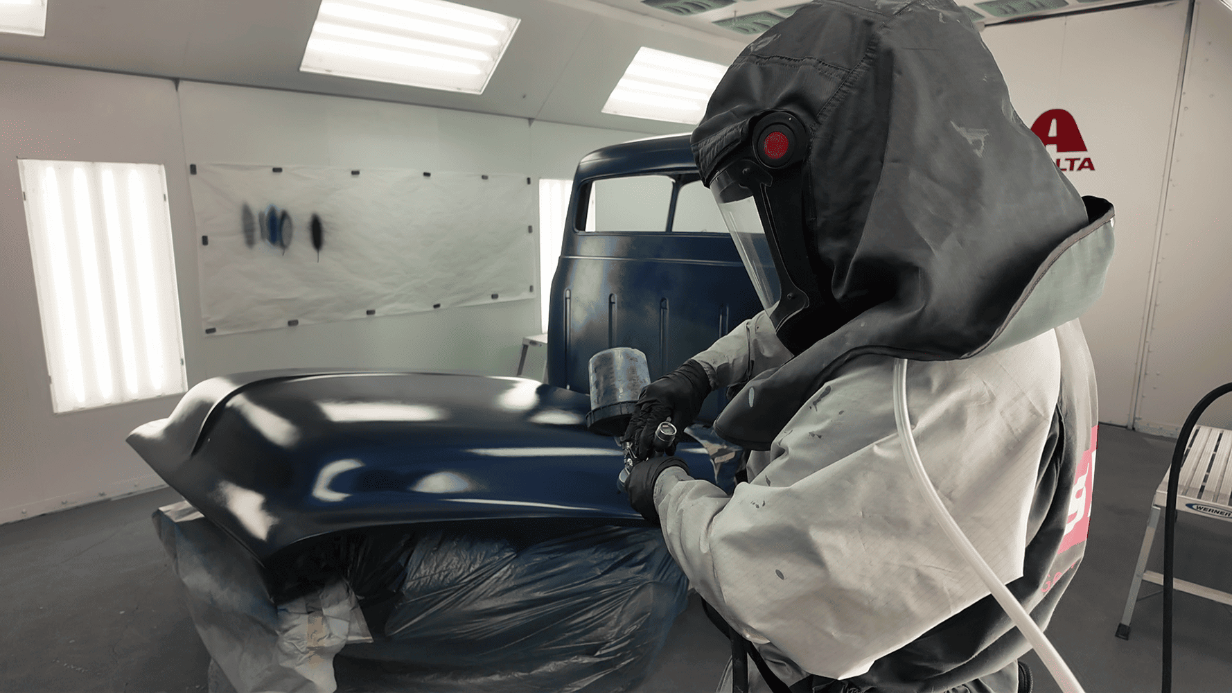 30 1956 Ford F 100 fender sprayed metallic blue by painter in full booth suit