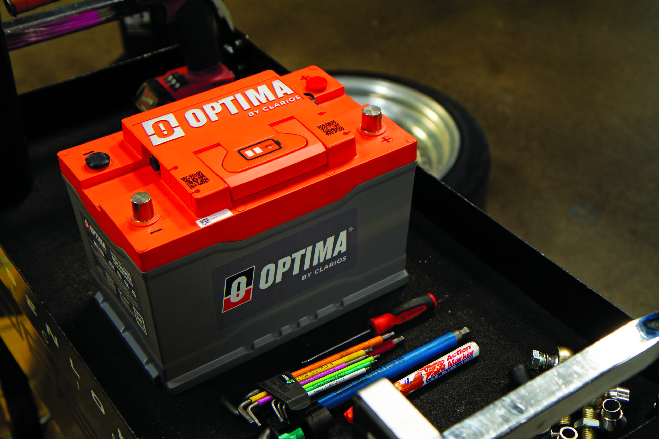 31 optima lithium battery mounted in tool cart with nearby screwdrivers and markers copy