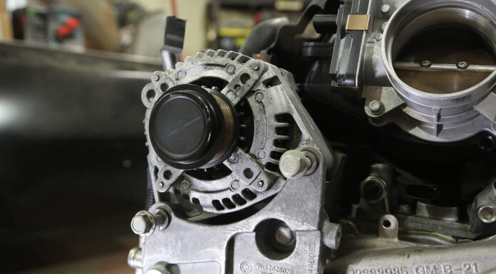 GM Gen V LT-Series Alternator Solutions 000 GM LS alternator front mount V8 casting mark and throttle body detail