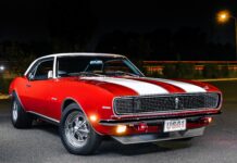 Day Two 1968 Chevy Camaro 001 1968 Chevrolet Camaro red with white stripes 302 badging and Cragar wheels