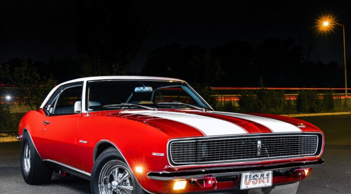 Day Two 1968 Chevy Camaro 001 1968 Chevrolet Camaro red with white stripes 302 badging and Cragar wheels