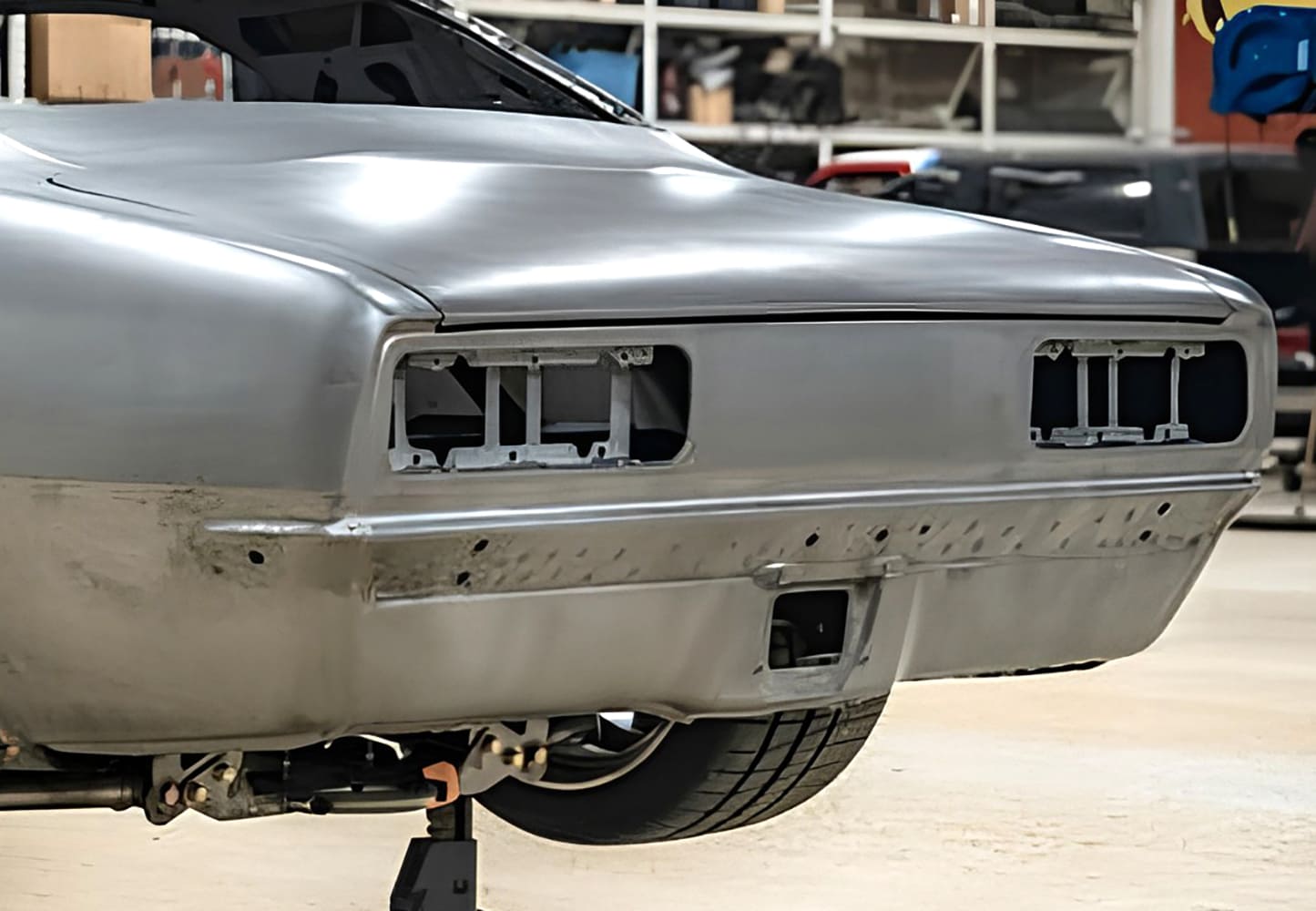 003 1968 Camaro bare metal body taillight panel mock up on jack stands