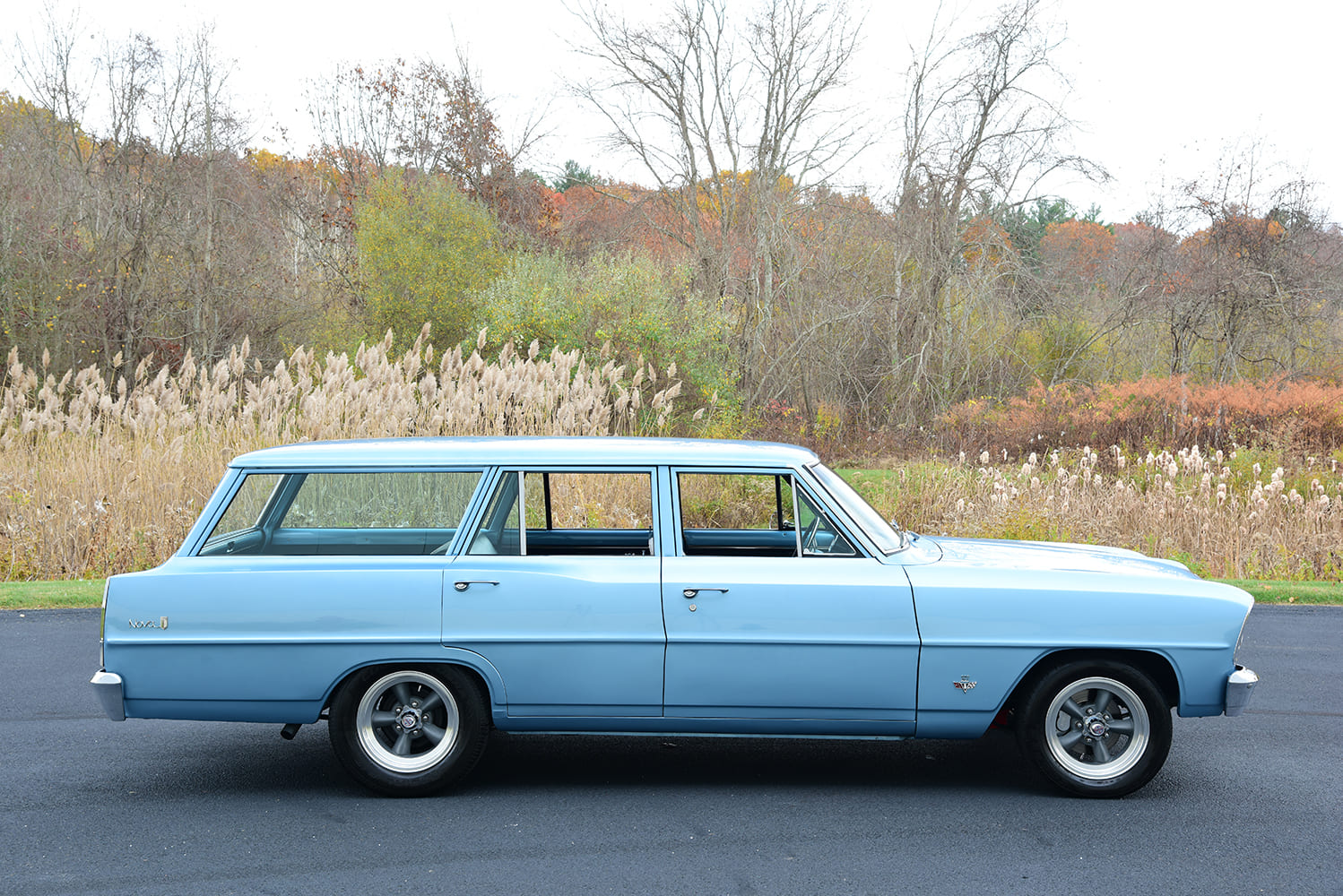 004 1966 Nova wagon side profile straight body clean lines chrome accents
