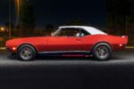 004 1968 Chevrolet Camaro side profile with white roof and staggered rear tires