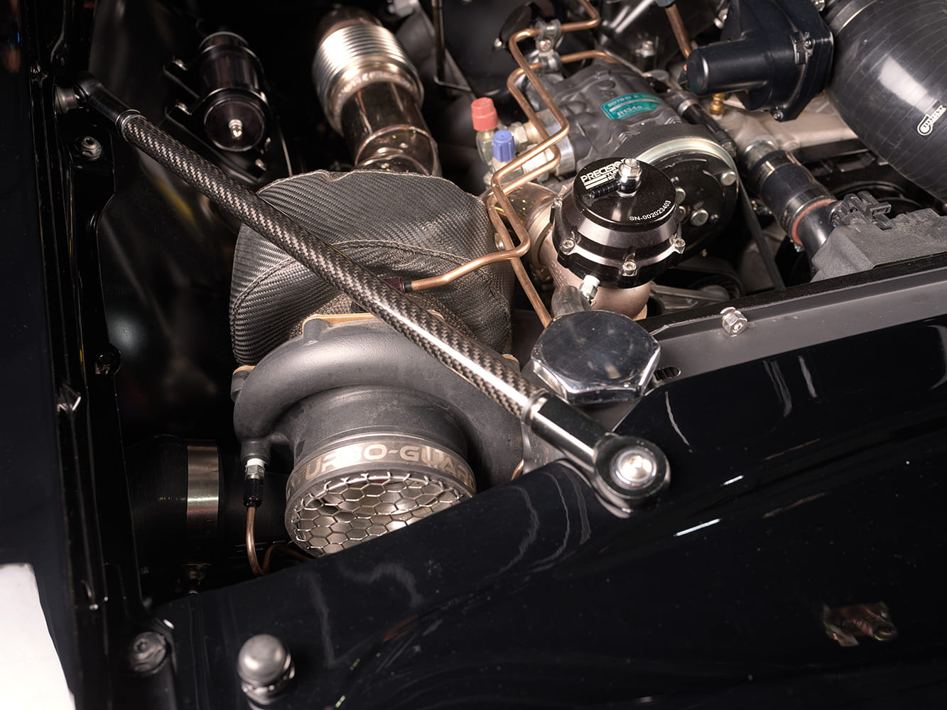 007 1969 camaro rear view ducktail spoiler tucked exhaust griffin badge