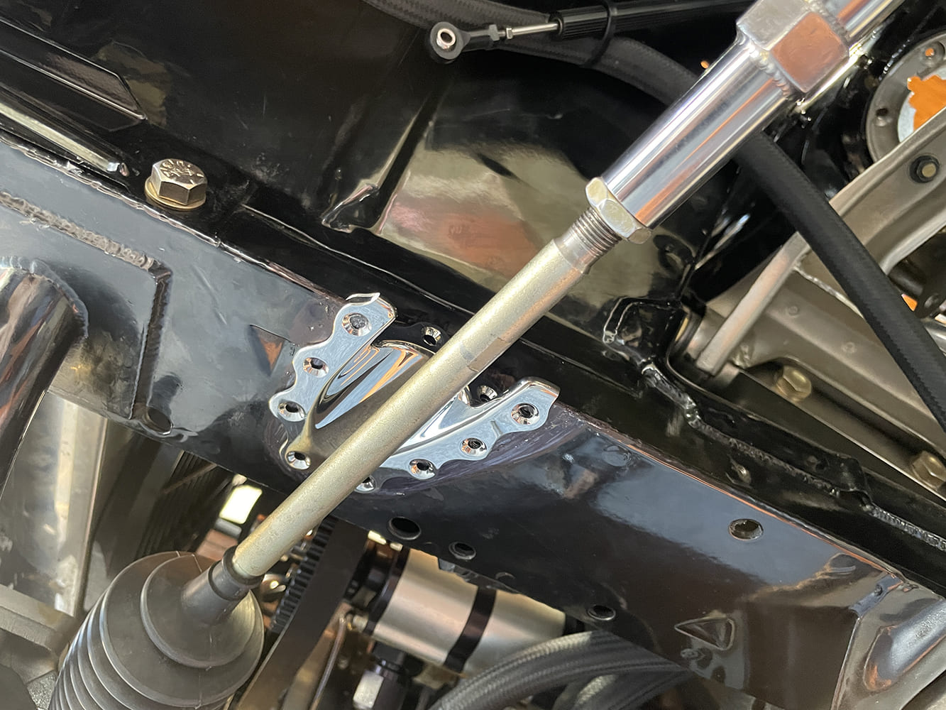 011 slotted billet bracket for rack position tuning on 1966 nova drag car